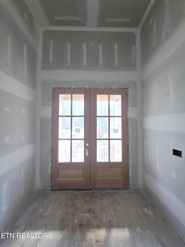 entryway featuring french doors