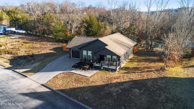 view of front facade with a garage and a front lawn