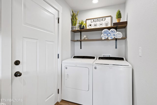 laundry room featuring washing machine and clothes dryer