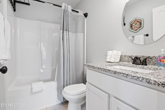 full bathroom with vanity, toilet, and shower / bath combo with shower curtain