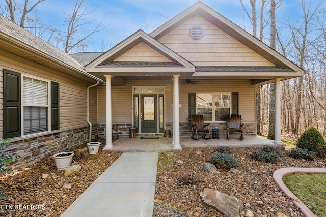 doorway to property with a porch