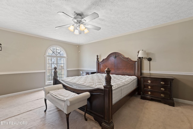 carpeted bedroom with crown molding, ceiling fan, and a textured ceiling