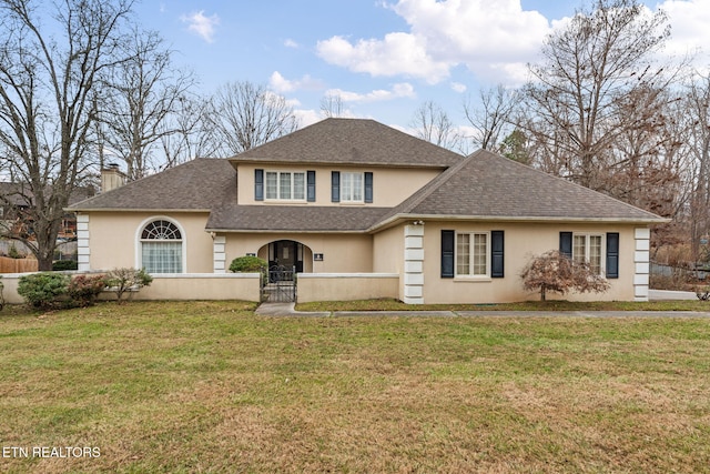 view of front facade featuring a front yard