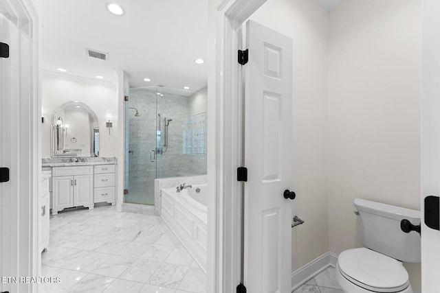 full bathroom with vanity, toilet, and separate shower and tub