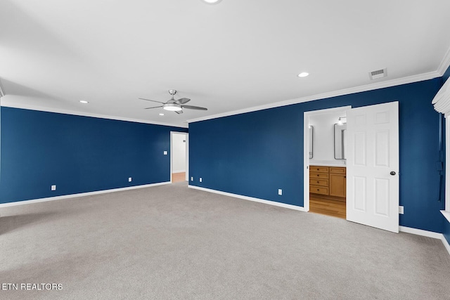 unfurnished room featuring ornamental molding, light carpet, and ceiling fan