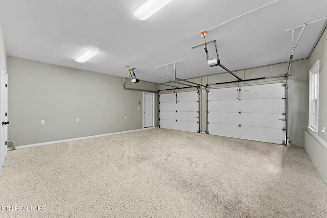 garage featuring a garage door opener