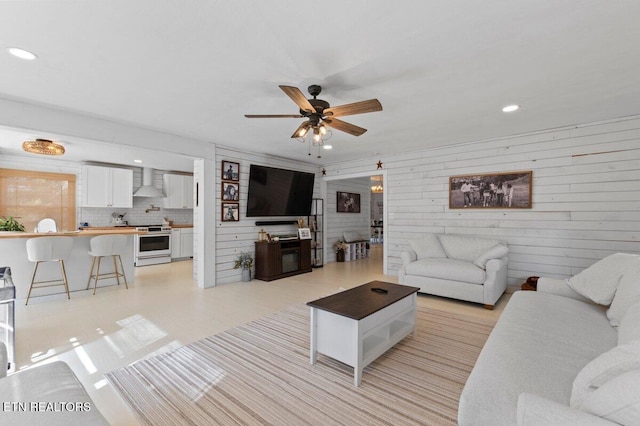 living room with ceiling fan