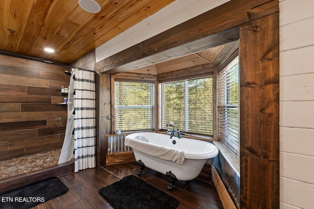 bathroom with independent shower and bath, wood-type flooring, wooden ceiling, and wooden walls