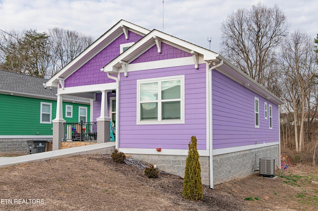 view of front of home with central air condition unit