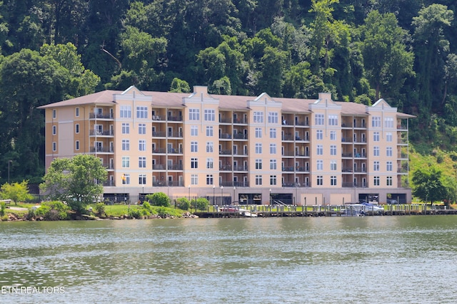 view of property with a water view