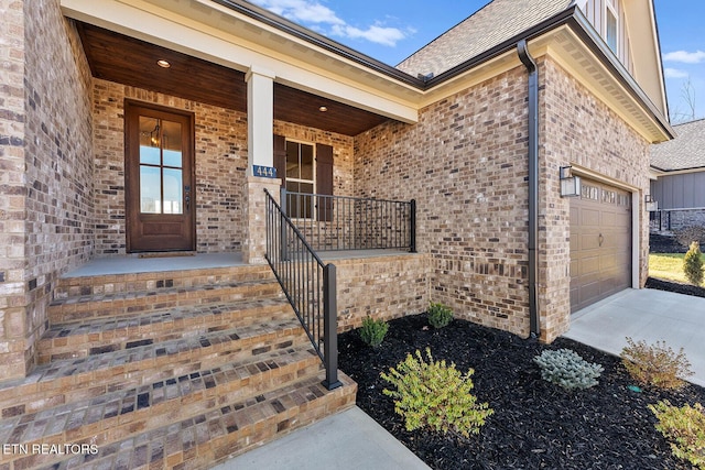 doorway to property featuring a garage