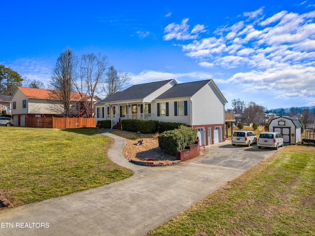 ranch-style house with a porch, a garage, and a front lawn