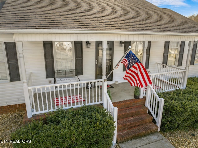 entrance to property with covered porch