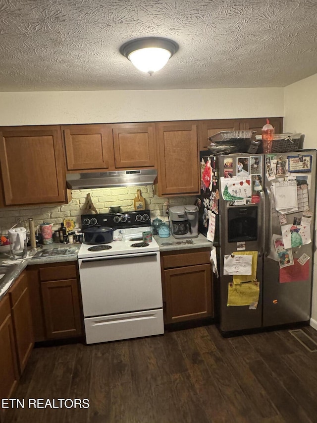 kitchen with dark wood-style floors, under cabinet range hood, white electric range, and stainless steel refrigerator with ice dispenser