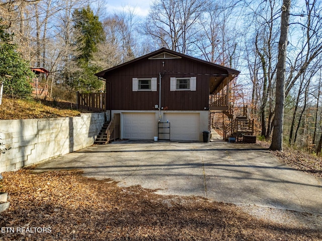 view of property exterior with a garage