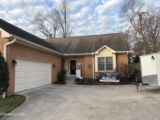 ranch-style house featuring a garage