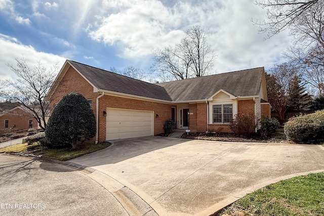 single story home featuring a garage