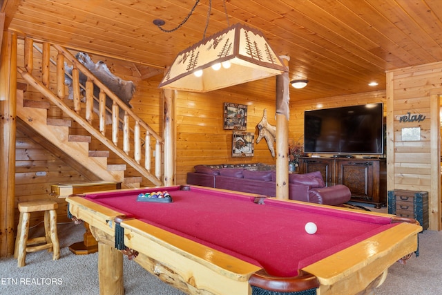 recreation room featuring wood ceiling, carpet floors, and wood walls