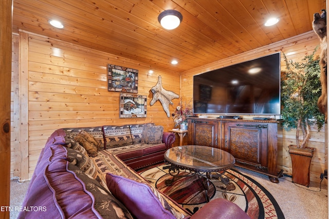 living room with wood ceiling, wooden walls, and light colored carpet