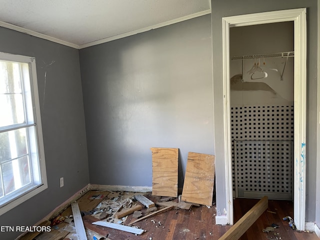4589 Mount Carmel Rd, Camden, TN 38320 - interior space with crown molding, baseboards, and wood finished floors