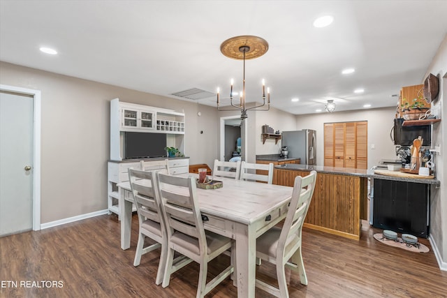 1731 Vonore Rd, Loudon, TN 37774 - dining area with wood finished floors, recessed lighting, a chandelier, and baseboards