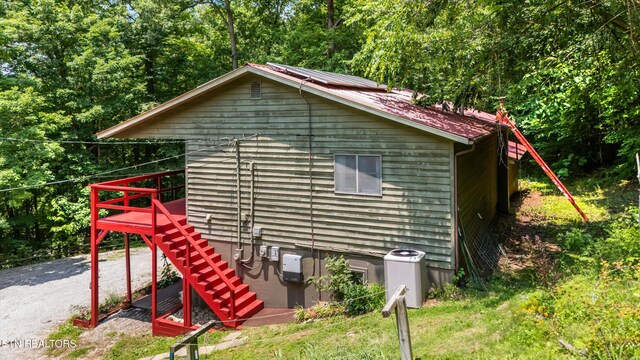 1731 Vonore Rd, Loudon, TN 37774 - view of side of home with central air condition unit, a deck, and stairway