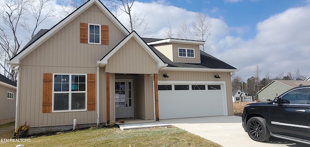 view of front facade with a garage and a front yard