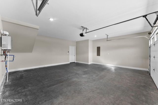 garage featuring electric panel, baseboards, and a garage door opener