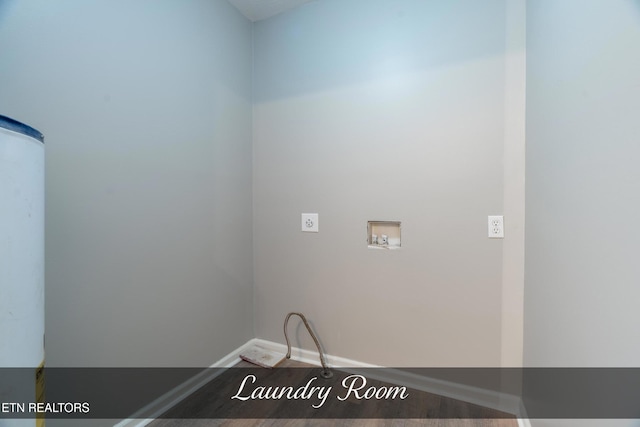 laundry area featuring hardwood / wood-style floors and hookup for a washing machine