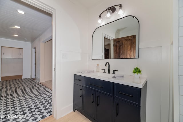 bathroom featuring vanity and hardwood / wood-style floors