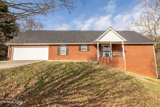 single story home with a garage, a porch, and a front lawn