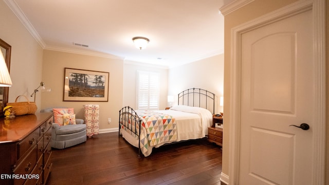 bedroom with crown molding and dark wood-type flooring