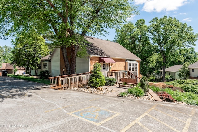 view of front of property featuring a deck