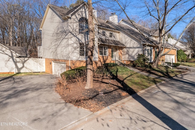 view of front of home with a garage