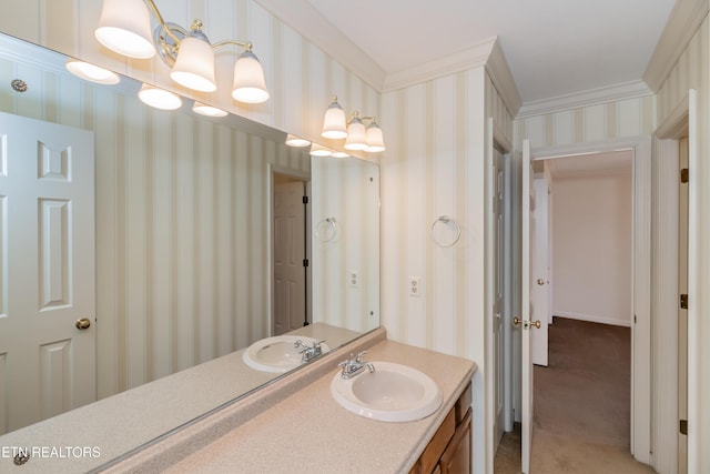 bathroom with vanity and ornamental molding