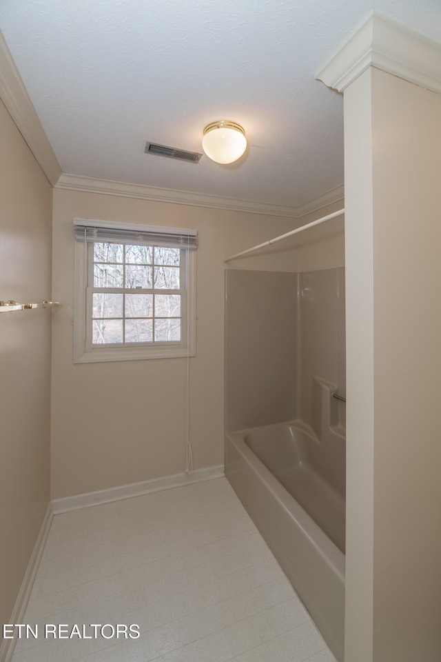 bathroom featuring crown molding