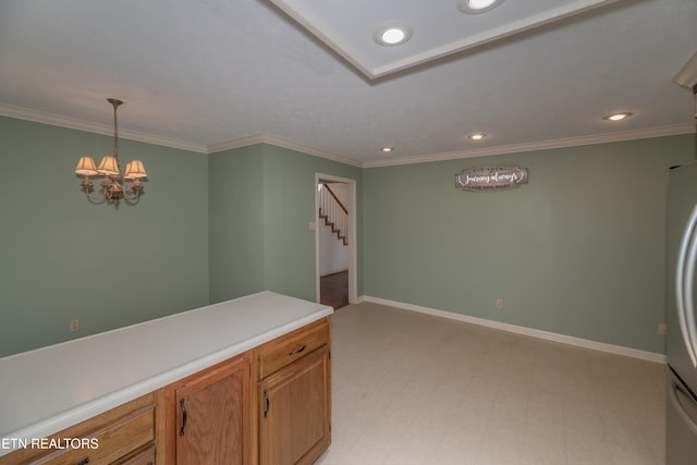 interior space featuring hanging light fixtures, crown molding, and a chandelier