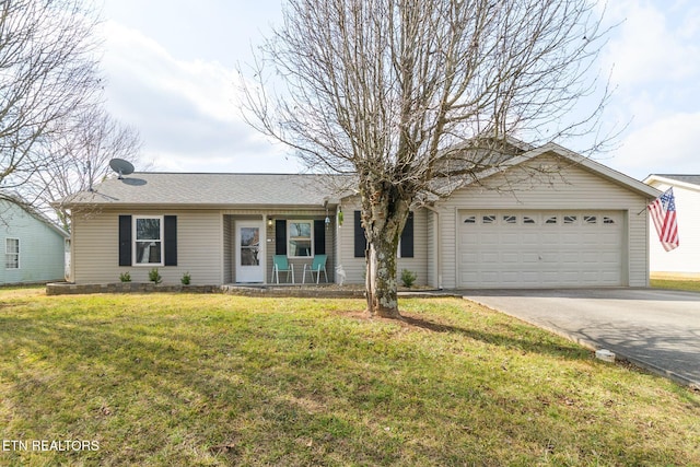 ranch-style home with a garage and a front lawn