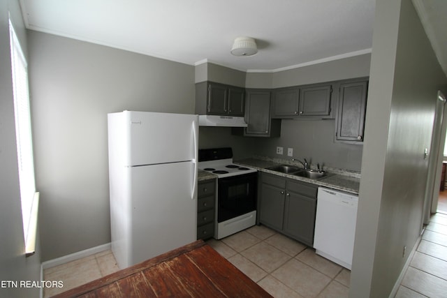 kitchen with light tile patterned flooring, sink, ornamental molding, light stone countertops, and white appliances