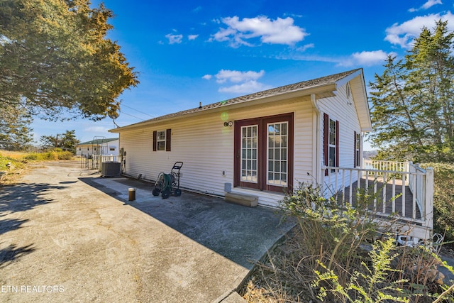 back of house featuring a patio area and central AC