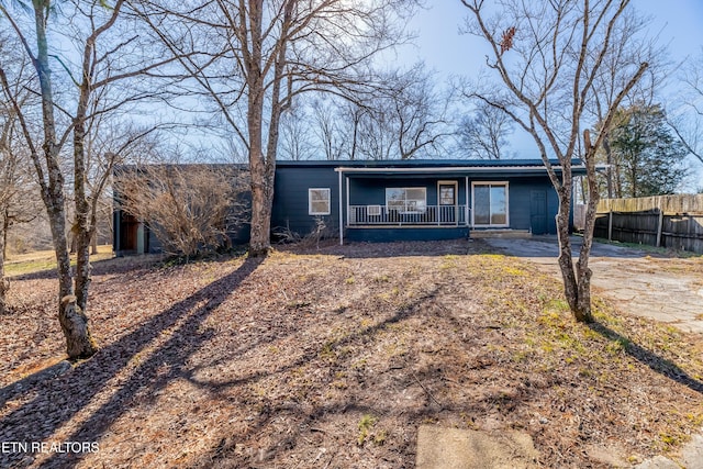 ranch-style home with covered porch