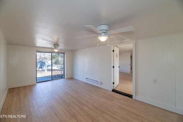 empty room with ceiling fan, a baseboard heating unit, and light wood-type flooring