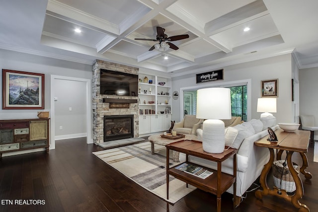 living room with coffered ceiling, beam ceiling, crown molding, wood-type flooring, and a fireplace