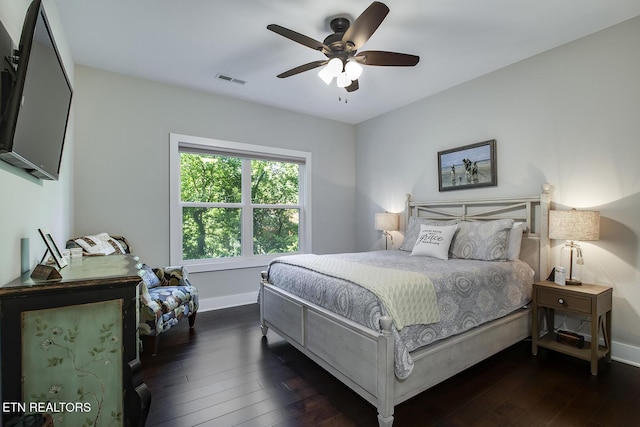 bedroom featuring dark hardwood / wood-style floors and ceiling fan