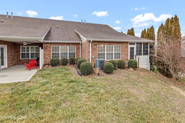 back of house with cooling unit, a yard, a patio area, and ceiling fan