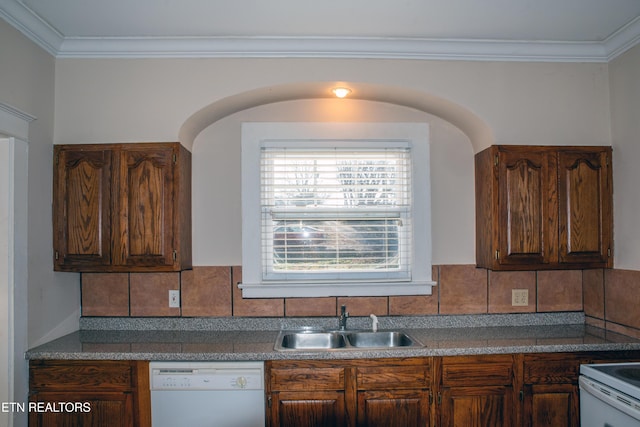 kitchen featuring crown molding, sink, white appliances, and decorative backsplash