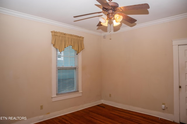 spare room featuring crown molding, dark hardwood / wood-style floors, and ceiling fan