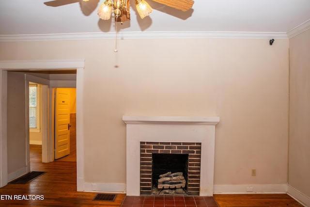 unfurnished living room with ceiling fan, ornamental molding, a fireplace, and dark hardwood / wood-style flooring