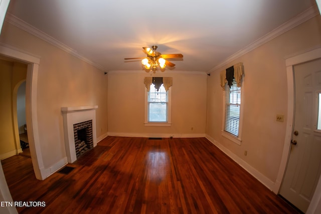 unfurnished living room featuring crown molding, dark wood-type flooring, and ceiling fan