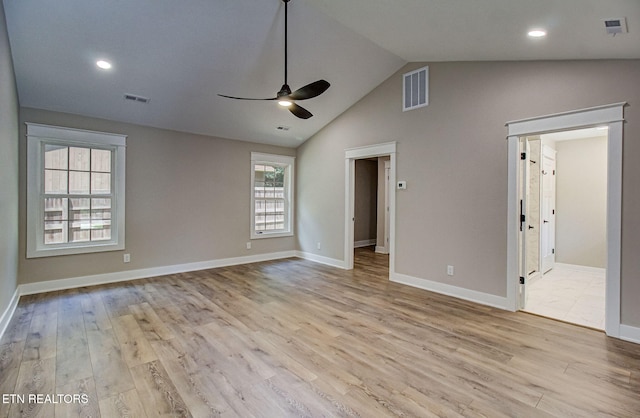 interior space featuring vaulted ceiling, ceiling fan, and light wood-type flooring